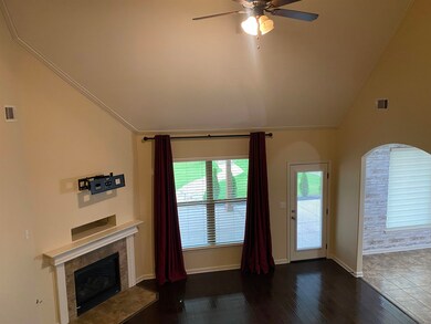 Unfurnished living room featuring ceiling fan, lof