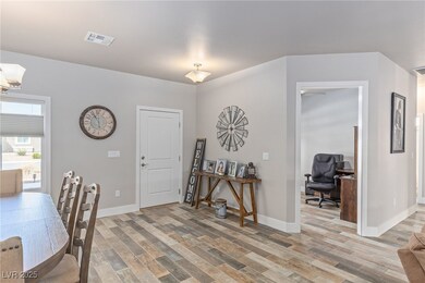 Dining space with light wood finished floors