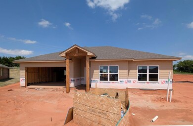 Property under construction featuring a shingled roof