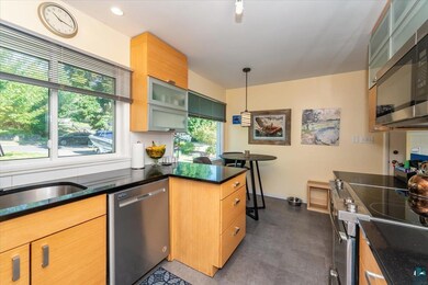 Kitchen featuring a healthy amount of sunlight, ha