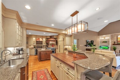 Modern, gourmet kitchen with two islands, two sink