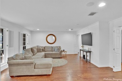 Living room featuring light hardwood / wood-style 