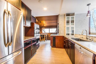 Eat-at table stays with the home. Door to the deck