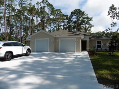 18 Regent Ln unit A,B, Palm Coast, FL 32164 - photo 2