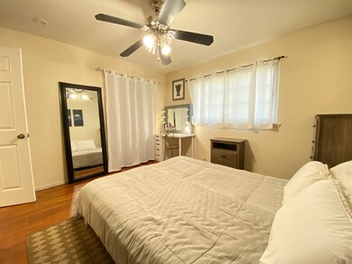The owners bedroom is large with room for oversize