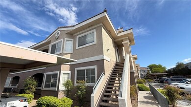 View of property exterior featuring stairs and stu