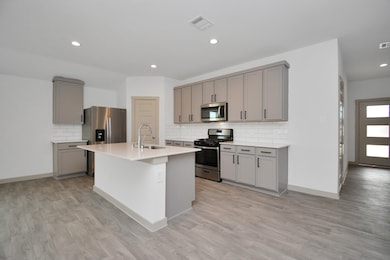 A peek into the Entry and the Modern Front Door to match the Modern Living!