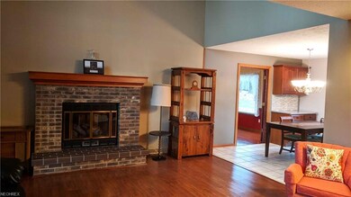 Living Room with Gas Fireplace and Open to the Eat