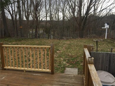 Fenced backyard overlooks Sullivan Town Park