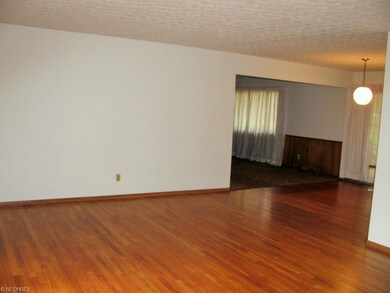 Living room, Dining room and Family room views