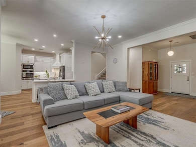Beautiful hard wood floors throughout the living room, foyer, kitchen, eat in dinging space, hallways and flex room.