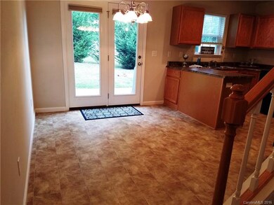 Dining area with back patio access.