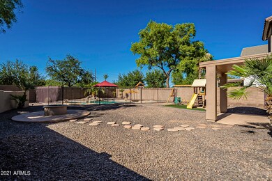 Huge yard,firepit, play area & pool