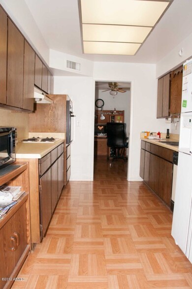 Kitchen, parquet flooring.