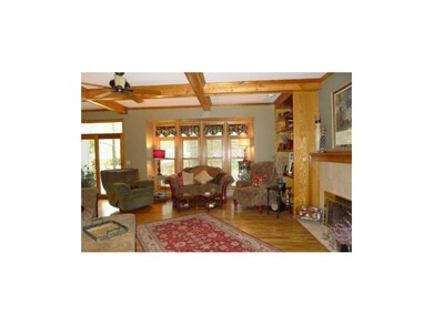 Transom topped wall of windows for natural light