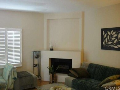 Living room with a cozy fireplace.