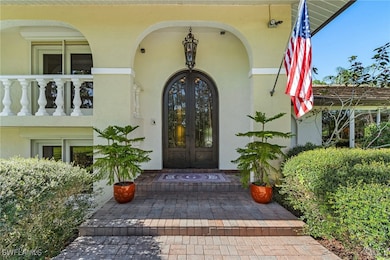 Entrance to property featuring french doors