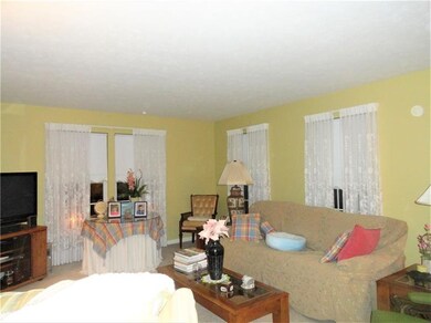 The front living room features floor-length front 