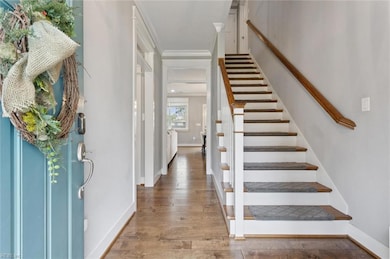 To the left is 1st BR/ Office area and full Bathroom.