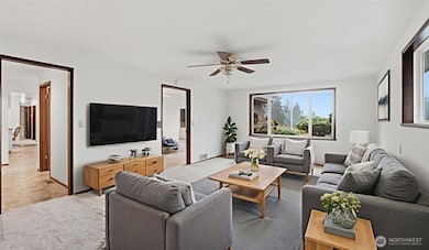 Bright and inviting living room, virtually staged to showcase the room’s spacious layout and natural light.