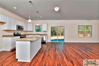 photo is of another completed home of the same flo