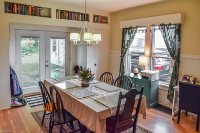 The dining room has built-ins and backyard access.