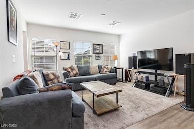 Living area featuring wood finished floors