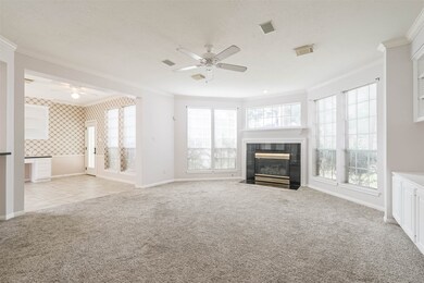 Large family room that is open to the kitchen and