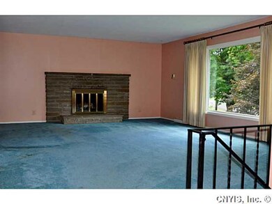 Living Room. The Living Room has a fireplace to ke