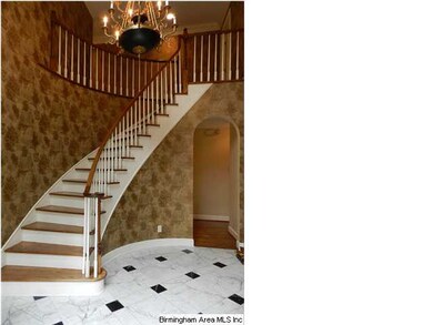 Foyer is so breathtaking with marble floor and win