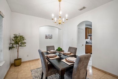 Two arched openings keep this dining room connecte