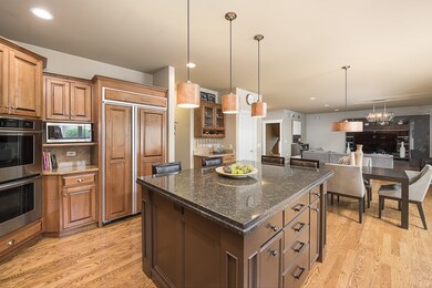 Kitchen with Huge Island with Granite