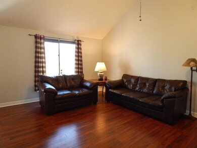 Large window in living area allows for lots of natural light
