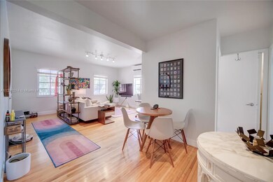 Unit # 3 - Living & Dining Area with original wood floors.  Unit # 3 is on second floor.