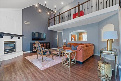 Living room featuring dark hardwood / wood-style f