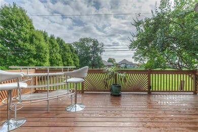 Deck overlooks greenspace!