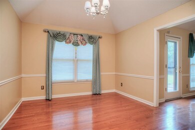 Dining Room features 10 ft. Ceiling and Chair Rail