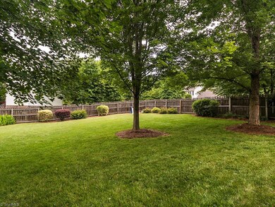 Flat Back Yard Fenced in with Mature trees