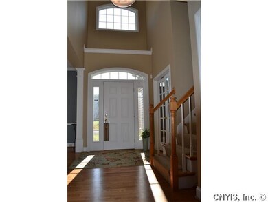 Foyer. Beautiful light and hardwoods upon entering