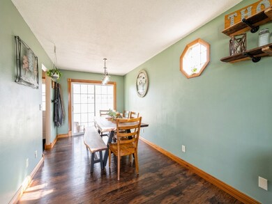 Formal dining area and the sliding glass door to g