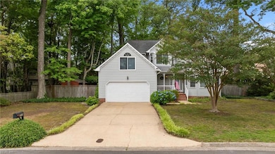 Meticulously maintained and lovingly cared for by long time owners, this 2 story Transitional Home is situated on a private and large .29 are lot in the established Briarwood  Meadow neighborhood in the heart of Great Bridge.