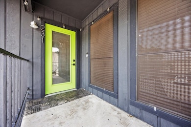 View of exterior entry featuring board and batten