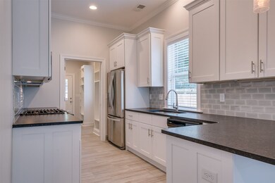 New Cabinets & Leathered Granite Counters