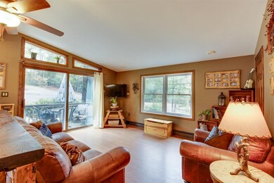 Warm tones and wood help keep this living space ni