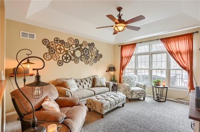 Light and bright living room...Check out the ceili