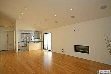 Living room w/vaulted ceilings, recessed lighting,