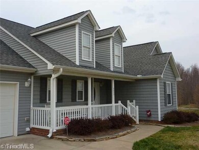 Exterior Front. Rocking chair front porch great for rainy days