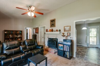 Get cozy by the fireplace.