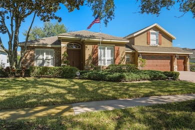 Welcome Home to your brick paver driveway, 3 car garage, and double front door entry