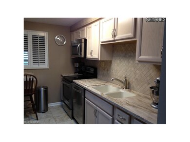Kitchen with granite countertops and 18